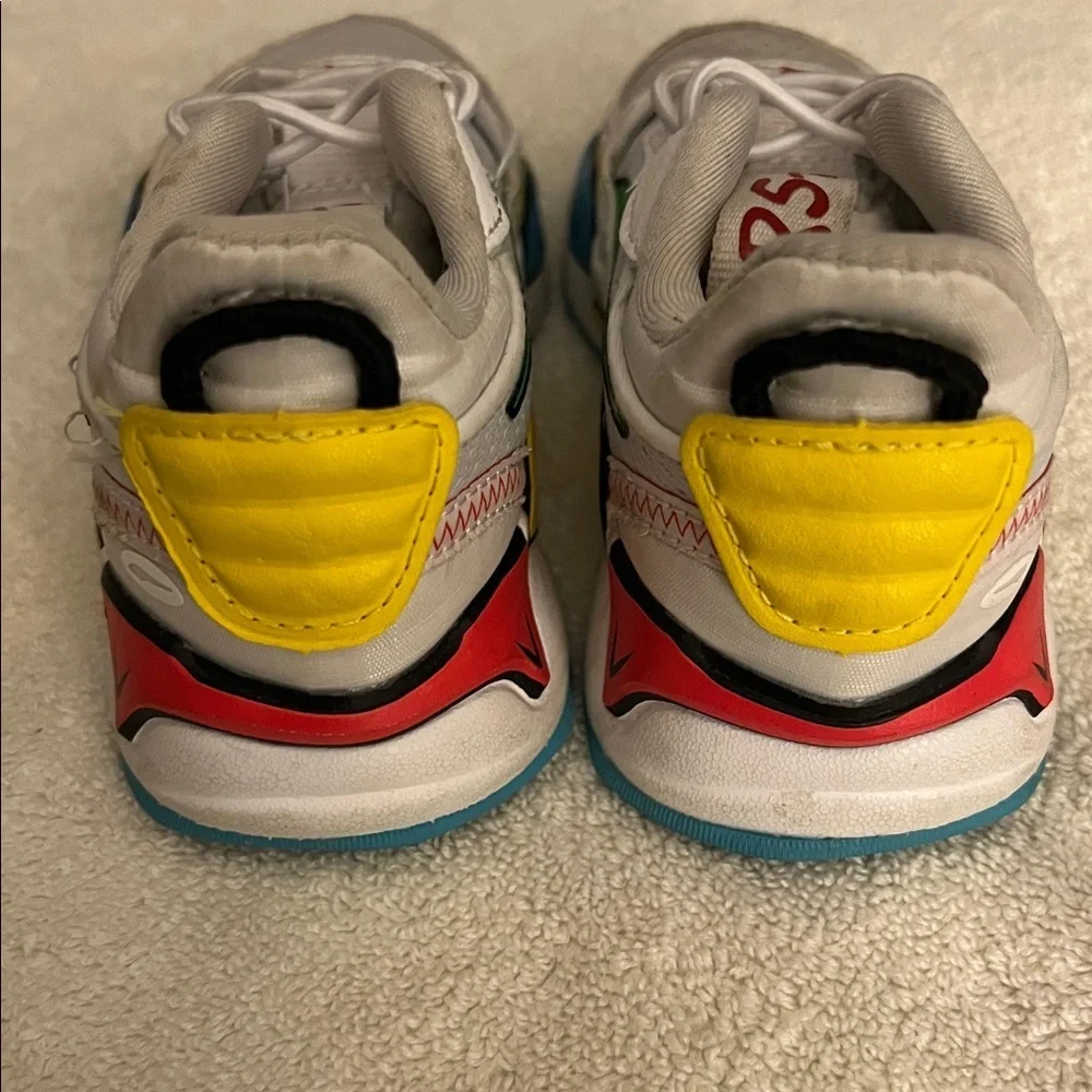 Puma Kids White Sneakers with Green, Blue & Yellow Accents
